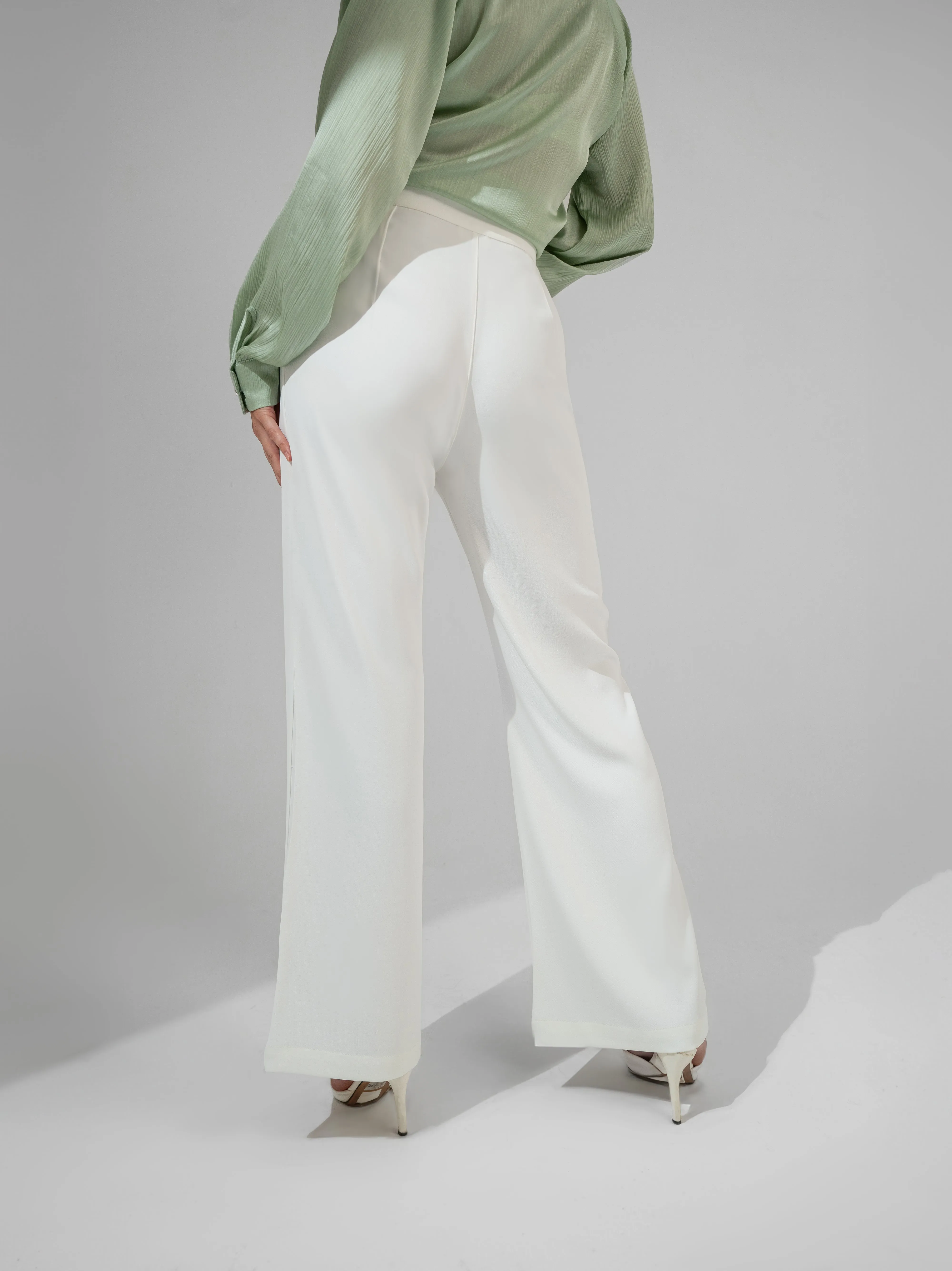 High-waist flared trousers – White