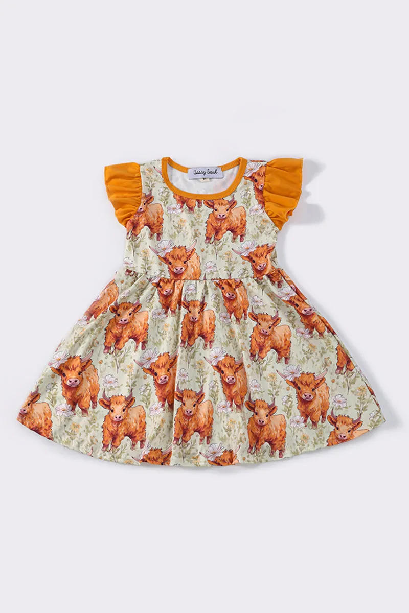 Orange cow ruffle dress